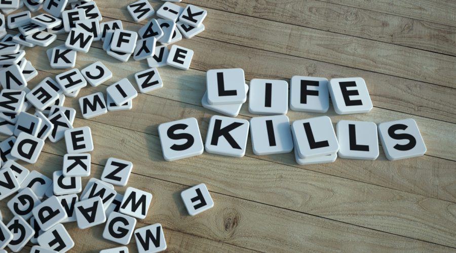 Life skills written in letter tiles wood